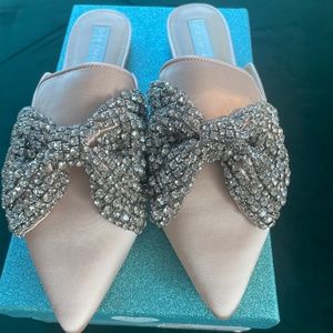 Betsey Johnson mules with embellished bow. Size 10